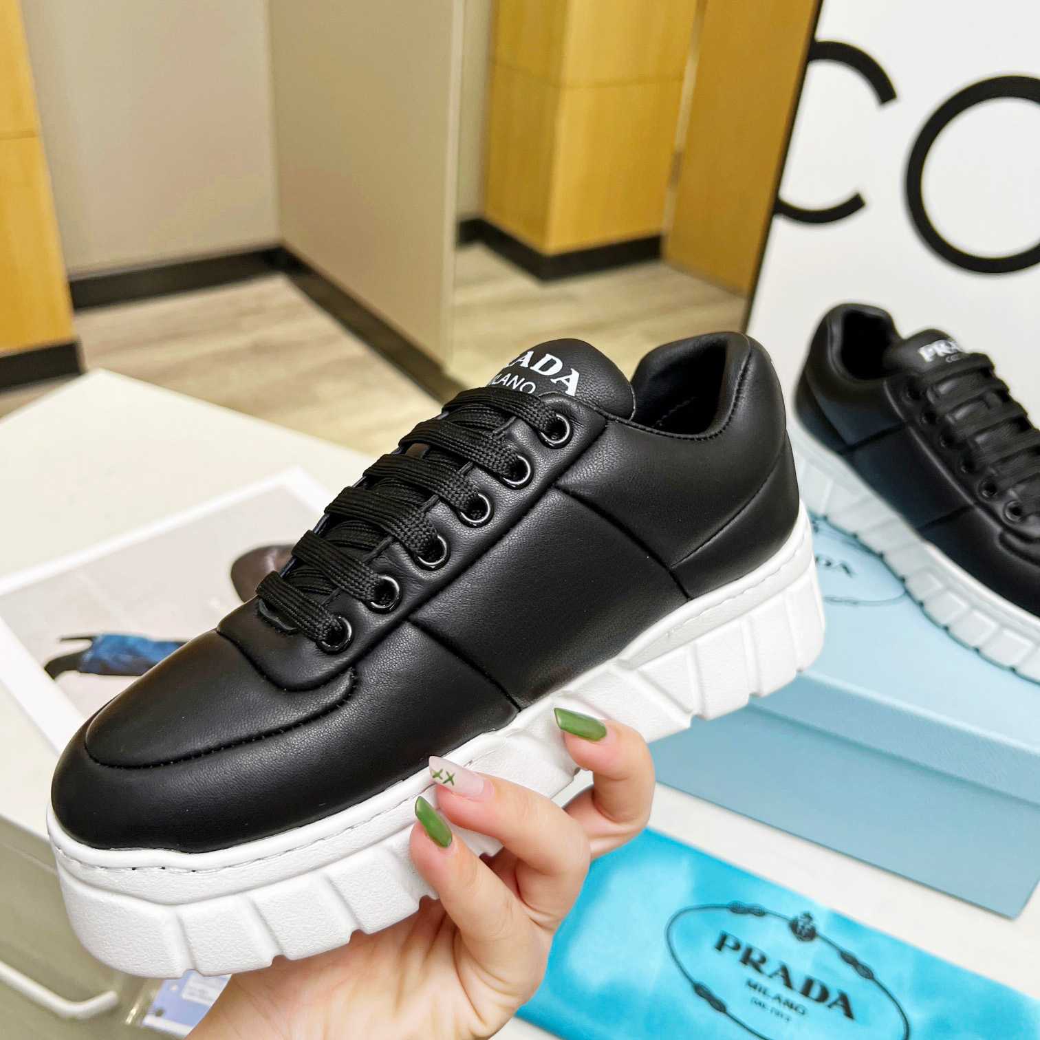 Prada Padded Nappa Leather Sneakers - DesignerGu