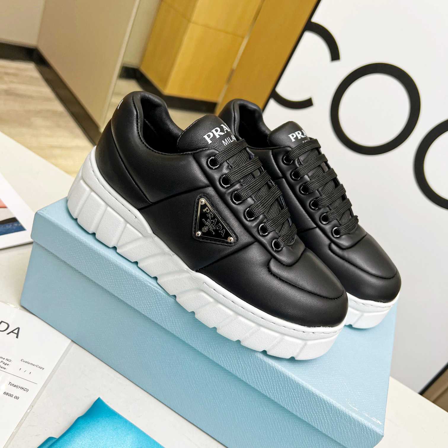 Prada Padded Nappa Leather Sneakers - DesignerGu