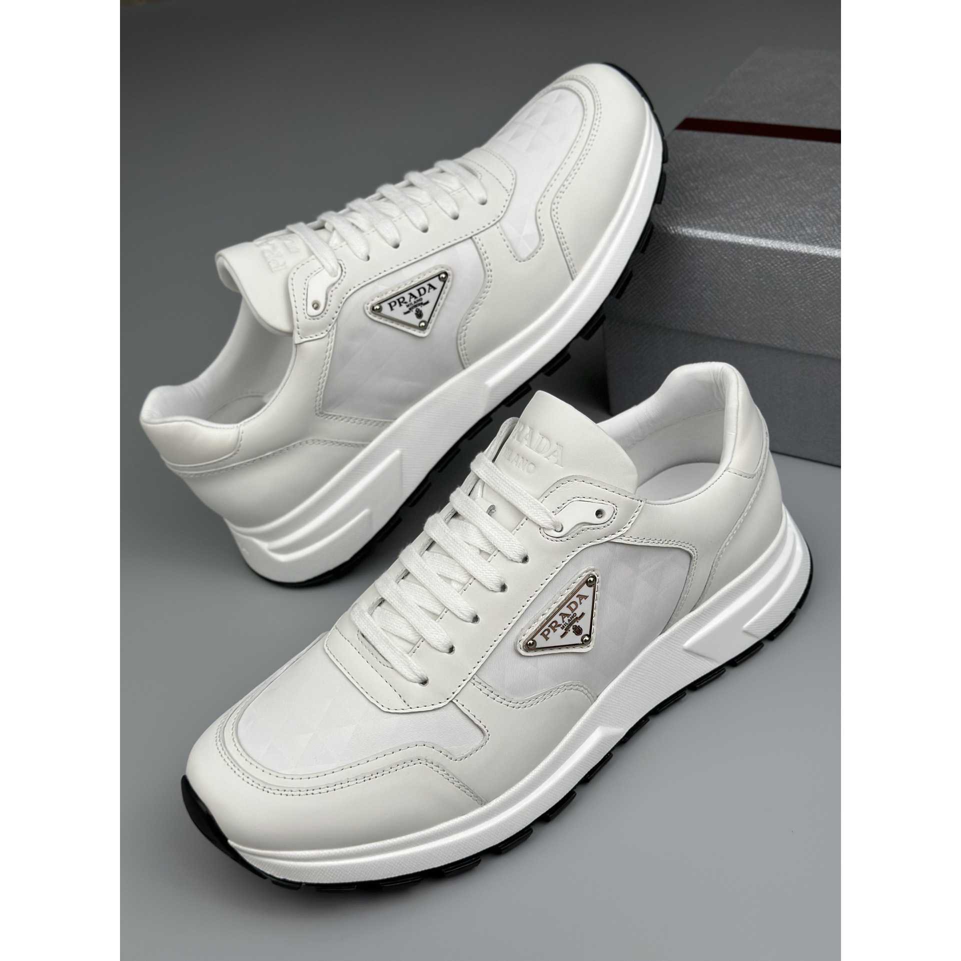 Prada Leather And Re-Nylon High-top Sneakers - DesignerGu