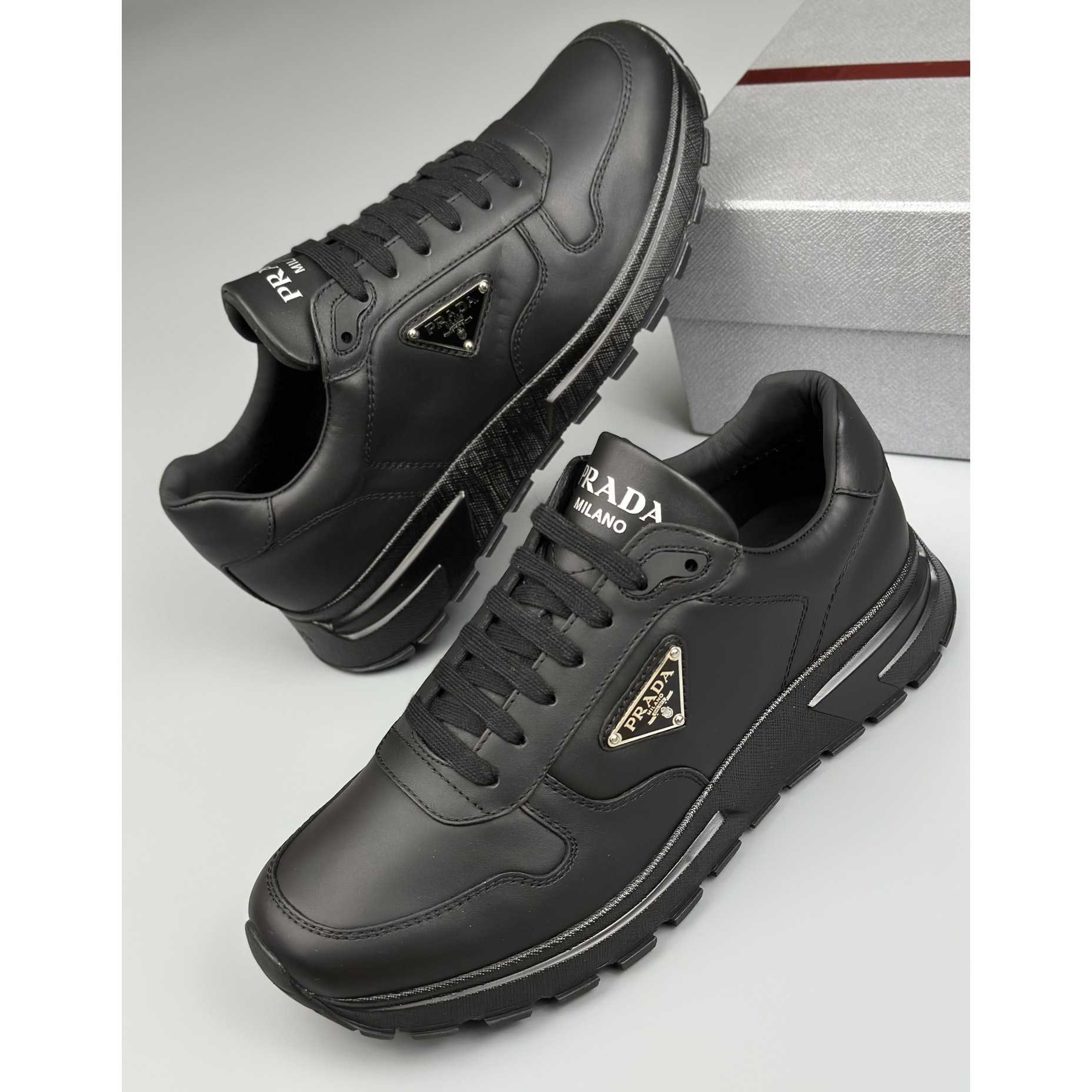 Prada Leather Sneakers - DesignerGu