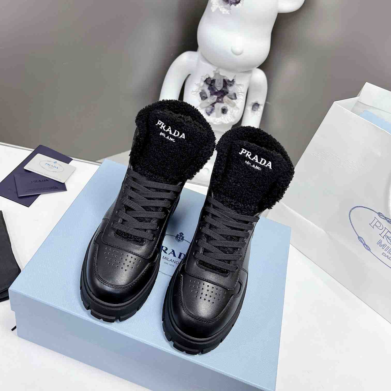 Prada Leather And Shearling High-top Sneakers - DesignerGu