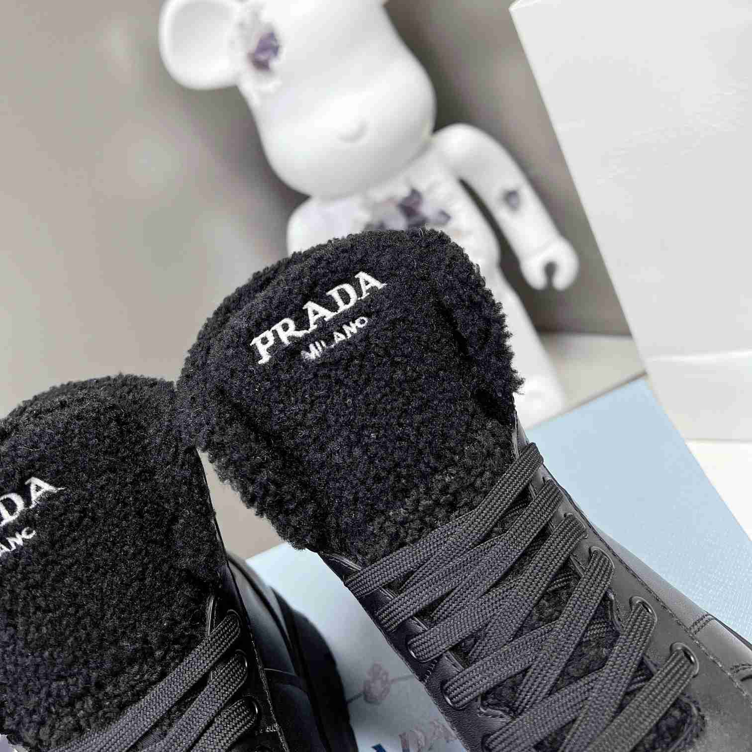 Prada Leather And Shearling High-top Sneakers - DesignerGu