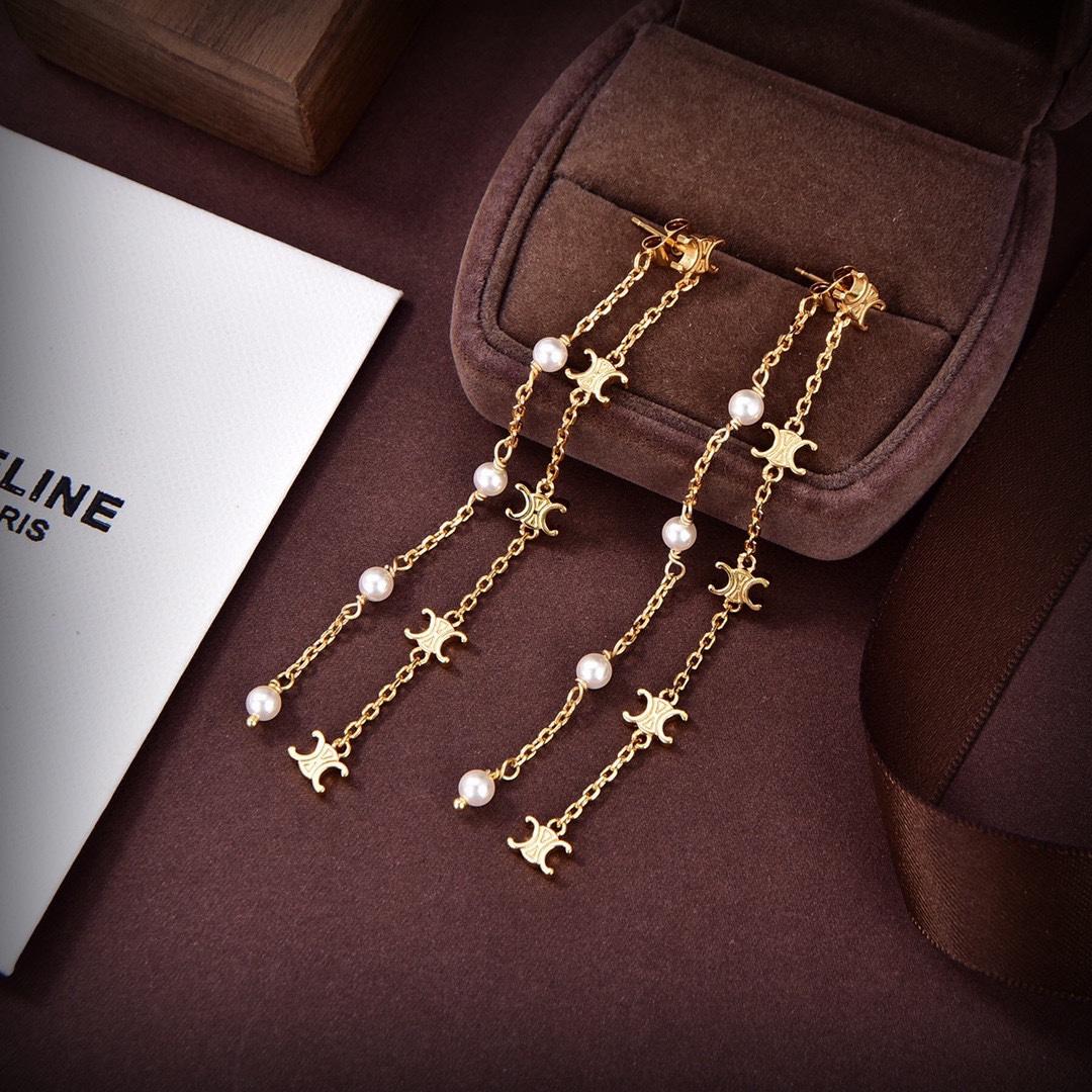 Celine Triomphe Long Pearl Earrings In Brass With Gold Finish And Resin Pearls - DesignerGu