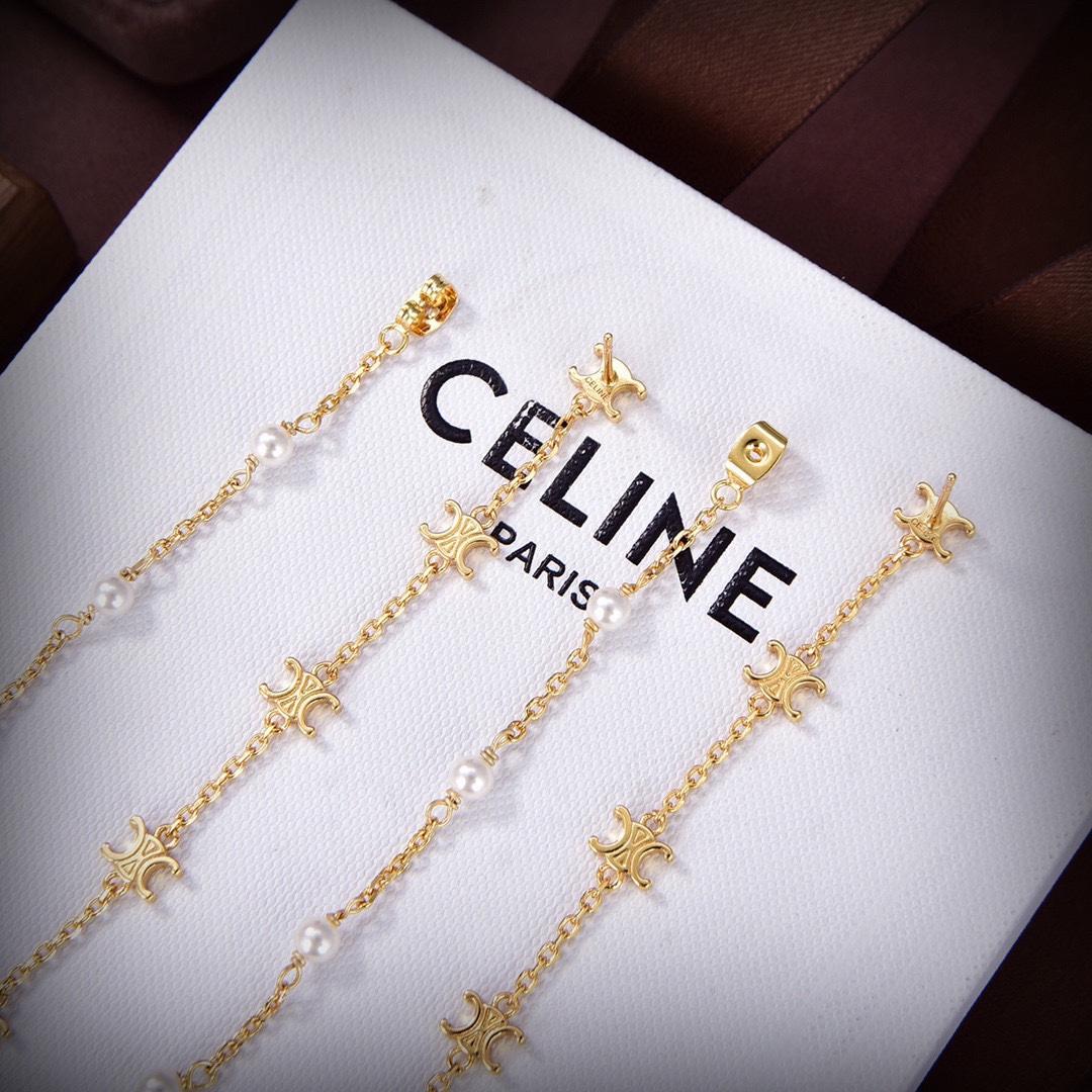 Celine Triomphe Long Pearl Earrings In Brass With Gold Finish And Resin Pearls - DesignerGu