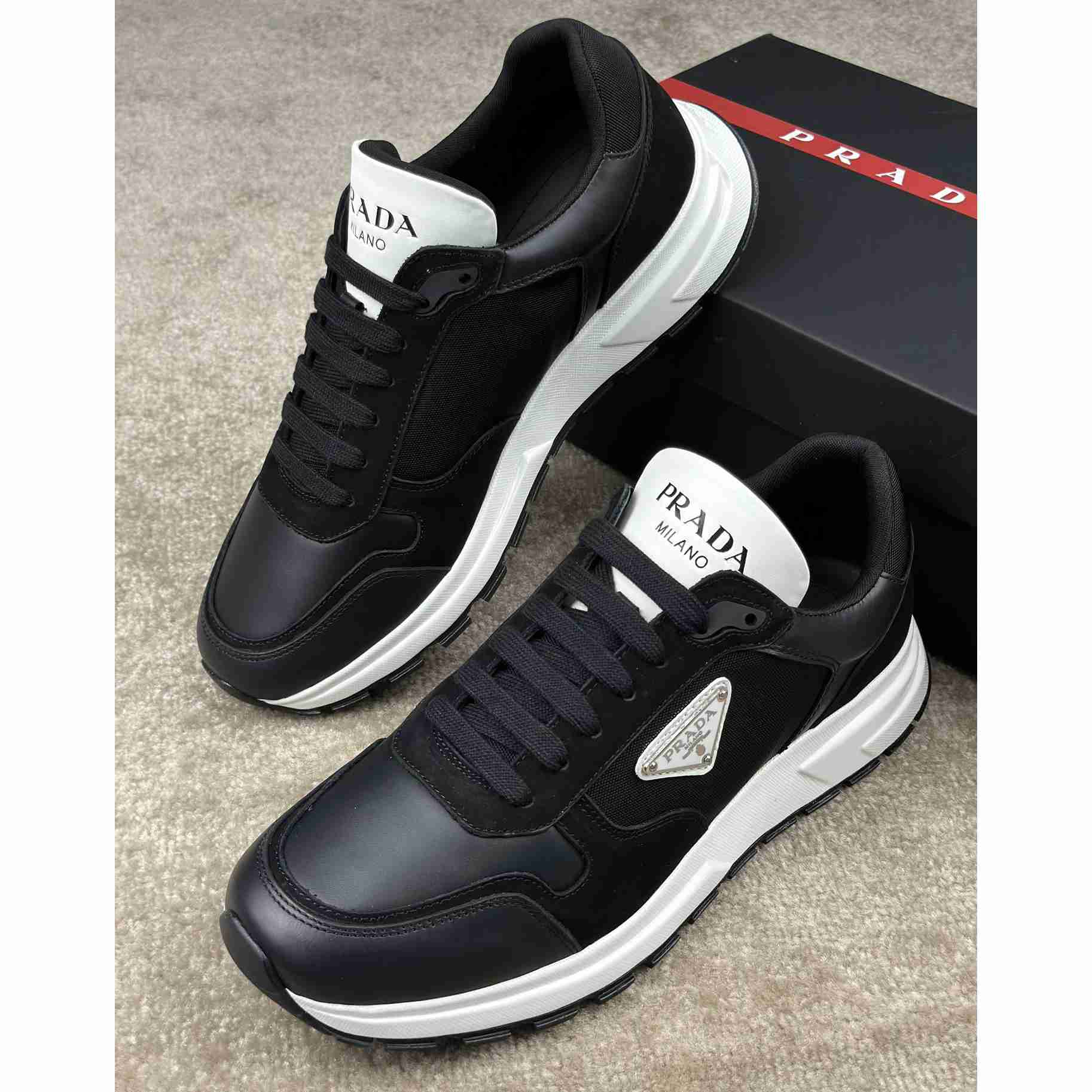 Prada Leather And Re-Nylon Sneakers - DesignerGu