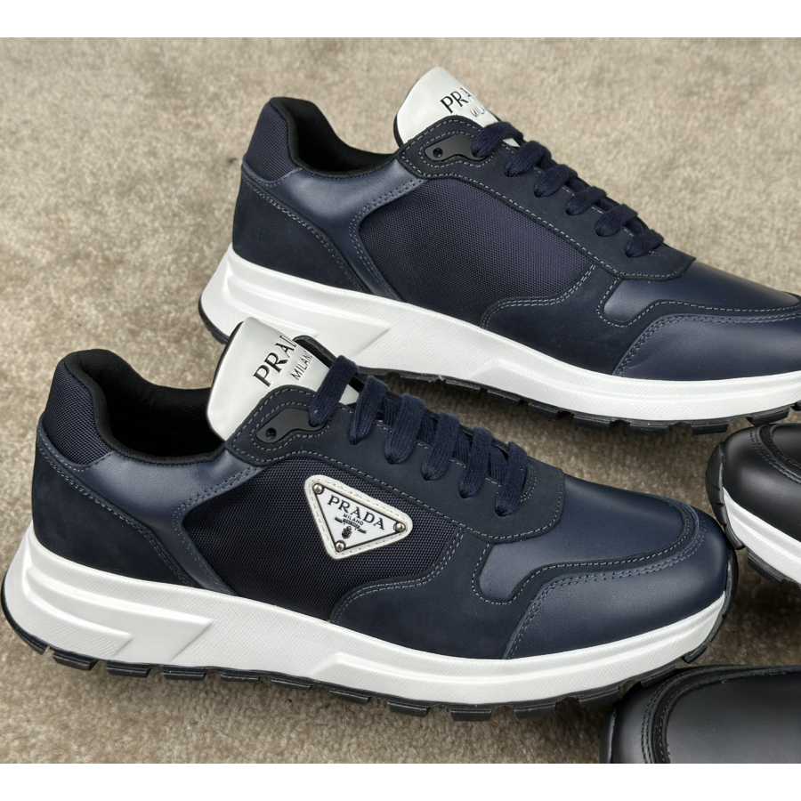 Prada Leather And Re-Nylon Sneakers - DesignerGu